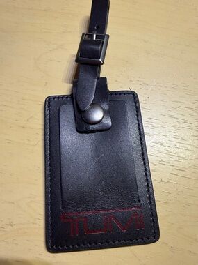 TUMI Black and Red Leather Luggage Tag